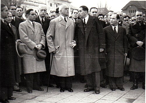 Funeral service for the "victims of Maniu's gangs", in November 1945. Front row, from the right: General Grigore Vasiliu Rășcanu, Teohari Georgescu, Gheorghe Tătărescu, Groza, Gheorghiu-Dej, Chivu Stoica, Petre Constantinescu-Iași. Ralea is visible second row, between Georgescu and Tătărescu