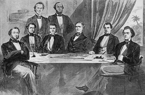 Davis's cabinet in 1861, Montgomery, AlabamaFront row, left to right: Judah P. Benjamin, Stephen Mallory, Alexander H. Stephens, Jefferson Davis, John Henninger Reagan, and Robert ToombsBack row, standing left to right: Christopher Memminger and LeRoy Pope WalkerIllustration printed in Harper's Weekly