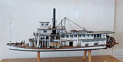 Model of an early 20th-century shallow draft stern wheel riverboat, the Upper Sacramento River steamer Red Bluff.