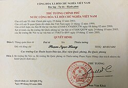 The red seal of the Prime Minister of Vietnam, featuring the Emblem of Vietnam, as seen on an official document. Vietnam no more uses logographic script and has also abolished the traditional square seal in official contexts.