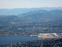 Aerial view of the south end of Lake Washington with a view of Renton Boeing plant at the tip