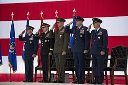 Four-star generals of the United States Air Force, United States Marine Corps, and United States Army participate in a Change of Command ceremony.