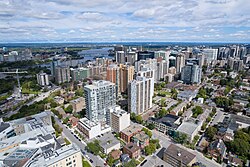 Downtown Ottawa is situated on the south bank of the Ottawa River with neighbouring Gatineau in the background across the river.
