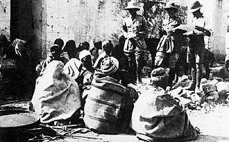 November 1918 British officer questioning the inhabitants of a captured village during the advance