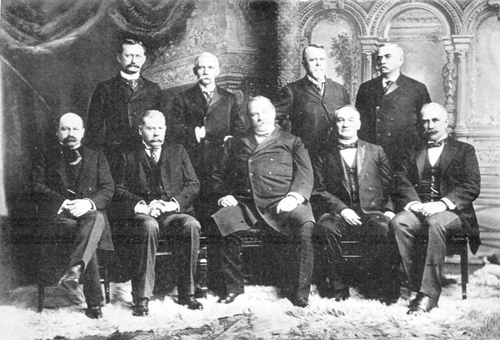 Cleveland's last Cabinet. Front row, left to right: Daniel S. Lamont, Richard Olney, Cleveland, John G. Carlisle, Judson Harmon Back row, left to right: David R. Francis, William Lyne Wilson, Hilary A. Herbert, Julius S. Morton