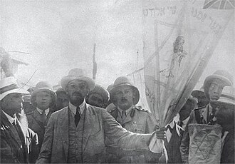 Weizmann holding a standard of the Jewish Legion, 1918