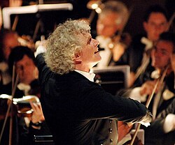 Sir Simon Rattle conducting the renowned Berlin Philharmonic