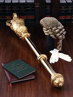 The mace of the Parliament of Queensland, symbolising the authority of parliament as derived from the Crown.[49]
