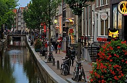 De Wallen, Amsterdam's red-light district, offers activities such as legal prostitution, symbolizing the Dutch political culture and tradition of tolerance.