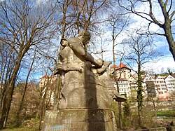 Nazi-era memorial. Soldiers emerge from behind composer Friedrich Silcher.