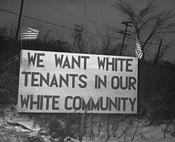 White tenants seeking to prevent Black people from moving into the housing project erected this sign, Detroit, 1942
