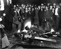 Lynching victim Will Brown, who was mutilated and burned during the Omaha, Nebraska race riot of 1919. Postcards and photographs of lynchings were popular souvenirs in the U.S.[13]