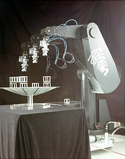 Programmable Universal Machine for Assembly, one of the first industrial robots (1990)