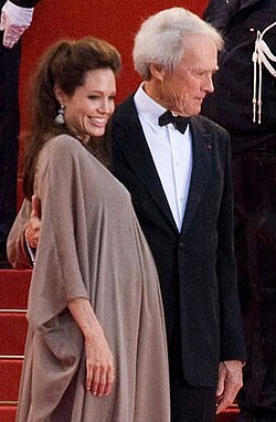A pregnant Jolie attending the premiere of Changeling with director Clint Eastwood at the 2008 Cannes Film Festival
