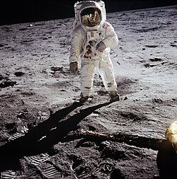 Astronauts Buzz Aldrin and Neil Armstrong (seen in visor reflection) during the 1969 Apollo 11 mission, the first crewed Moon landing. The United States is the only country to have landed humans on the Moon.