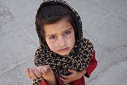Afghan girl begging in Kabul