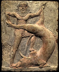 Ancient Mesopotamian terracotta relief showing Gilgamesh slaying the Bull of Heaven, sent by Ishtar in Tablet VI of the Epic of Gilgamesh after he spurns her amorous advances[322]
