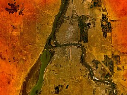 An aerial view of the confluence of the Nile rivers. Khartoum lies between the two rivers, with Omdurman on the west bank slightly downstream.
