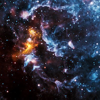 Radiation from the rapidly spinning pulsar PSR B1509−58 makes nearby gas emit X-rays (gold) and illuminates the rest of the nebula, here seen in infrared (blue and red).