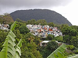 A church cemetery perched in the mountains of Guadeloupe