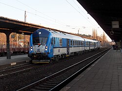 Very short commuter train in push mode.