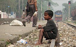 Street child in Bangladesh. Aiding relatives financially unable to but willing to take in orphans is found to be more effective by cost and welfare than orphanages.[163]