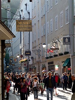View of shoppers on Getreidegasse, which is one of the oldest streets in Salzburg