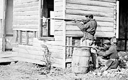 USCT soldiers at an abandoned farmhouse in Dutch Gap, Virginia, 1864