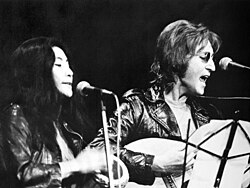 Lennon and Ono performing at the John Sinclair Freedom Rally in December 1971
