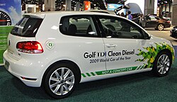 A Volkswagen Golf TDI in 2010, featuring the phrase "clean diesel" (a type of fuel, also known as ultra-low-sulfur diesel). The company later faced scrutiny and conviction due to an emissions scandal.
