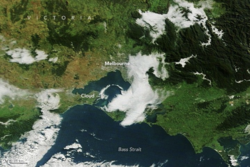 Fog fills networks of river valleys in eastern Victoria, May 11, 2026. NASA Earth Observatory. Note the arch-shaped cloud over Port Phillip Bay.