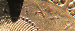 The name Wōđnas on a bracteate from the early 5th century AD, written as mirrored text
