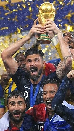 Giroud lifting the FIFA World Cup Trophy