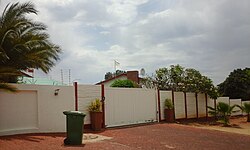 A house in Windhoek's Hochland Park suburb. The white flag indicates marriage arrangements are in place.
