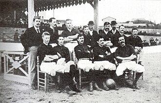 John Parsons seated, first from the left, next to other pioneers of Catalan football such as his brother William, the Morris brothers, James Reeves, and Alberto Serra.