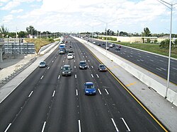 I-95 southbound lanes at the Lantana Road interchange, with northbound lanes to the right