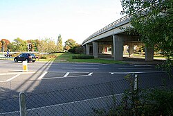 The A348 road runs over the bridge at Fleetsbridge, Poole.