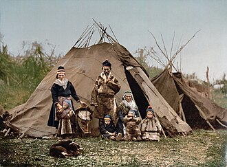 A Sámi family in Norway around 1900. Reindeer have been herded for centuries by several Arctic and Subarctic people including the Sámi and the Nenets.[13]