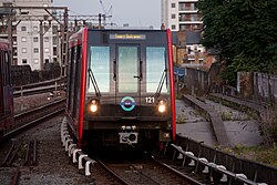 The Docklands Light Railway in London allows for dense land use, while retaining a high capacity.