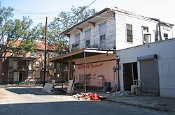One of the few surviving buildings from Storyville, 2005 photograph. 100 years earlier, the "New Image Supermarket" building housed Frank Early's saloon, where Tony Jackson regularly played.