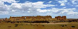 These rammed earth ruins of a granary in Hecang Fortress (Chinese: 河仓城; Pinyin: Hécāngchéng), located ~11 km (7 miles) northeast of the Yumen Pass, were built during the Western Han (202 BC – 9 AD) and significantly rebuilt during the Western Jin (280–316 AD).[41]
