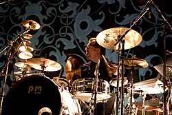 Pat Mastelotto playing a kit with both acoustic and electronic drums, 2005.