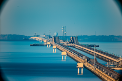 Photo of the causeway taken from a vantage point chosen to display its curvature