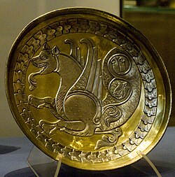 A Sasanian silver plate featuring a simurgh. The mythical bird was used as the royal emblem in the Sasanian period.[143]