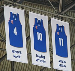 Nakić, D. Petrović & Knego's jerseys hanging in the rafters of the Dražen Petrović Basketball Hall