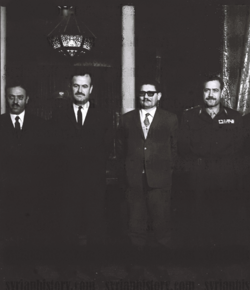 Four men in suits