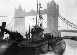 U-155 exhibited near Tower Bridge in London, after the 1918 Armistice