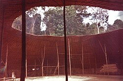Interior of Yanomami shabono, showing circular structure with separate divisions for each family around a central communal space