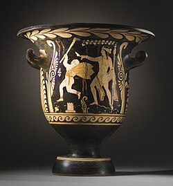 Ancient Greek bell krater pottery with an elderly satyr followed by young Dionysos