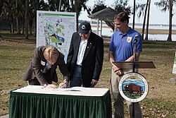 In 2012, former president Brian McPeek in his then role as chief operating officer, signed over the deed to 10 acres (4 ha) of land for the initial donation to establish the Everglades Headwaters National Wildlife Refuge in Florida.